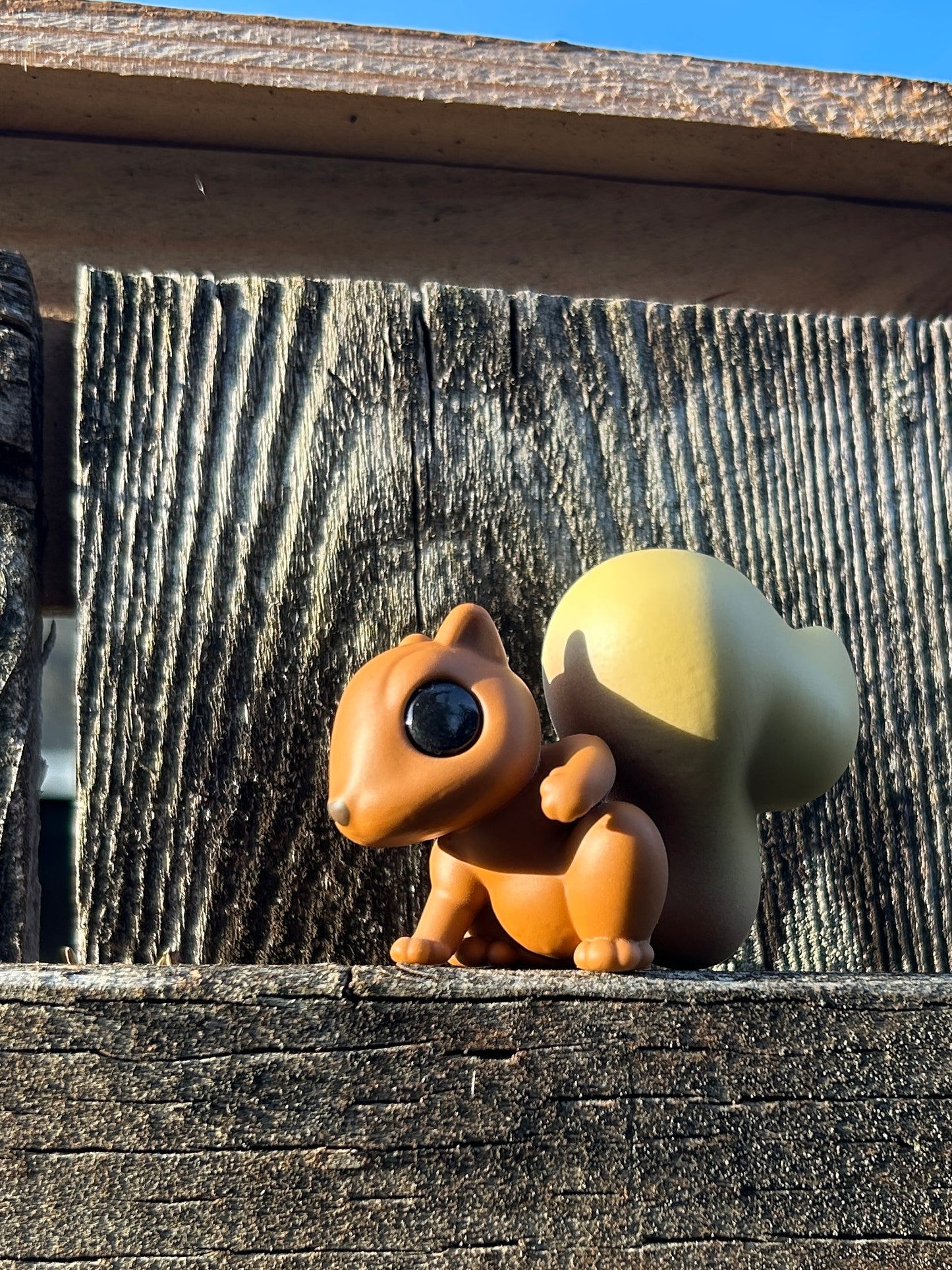 Red squirrel with blonde tail figure