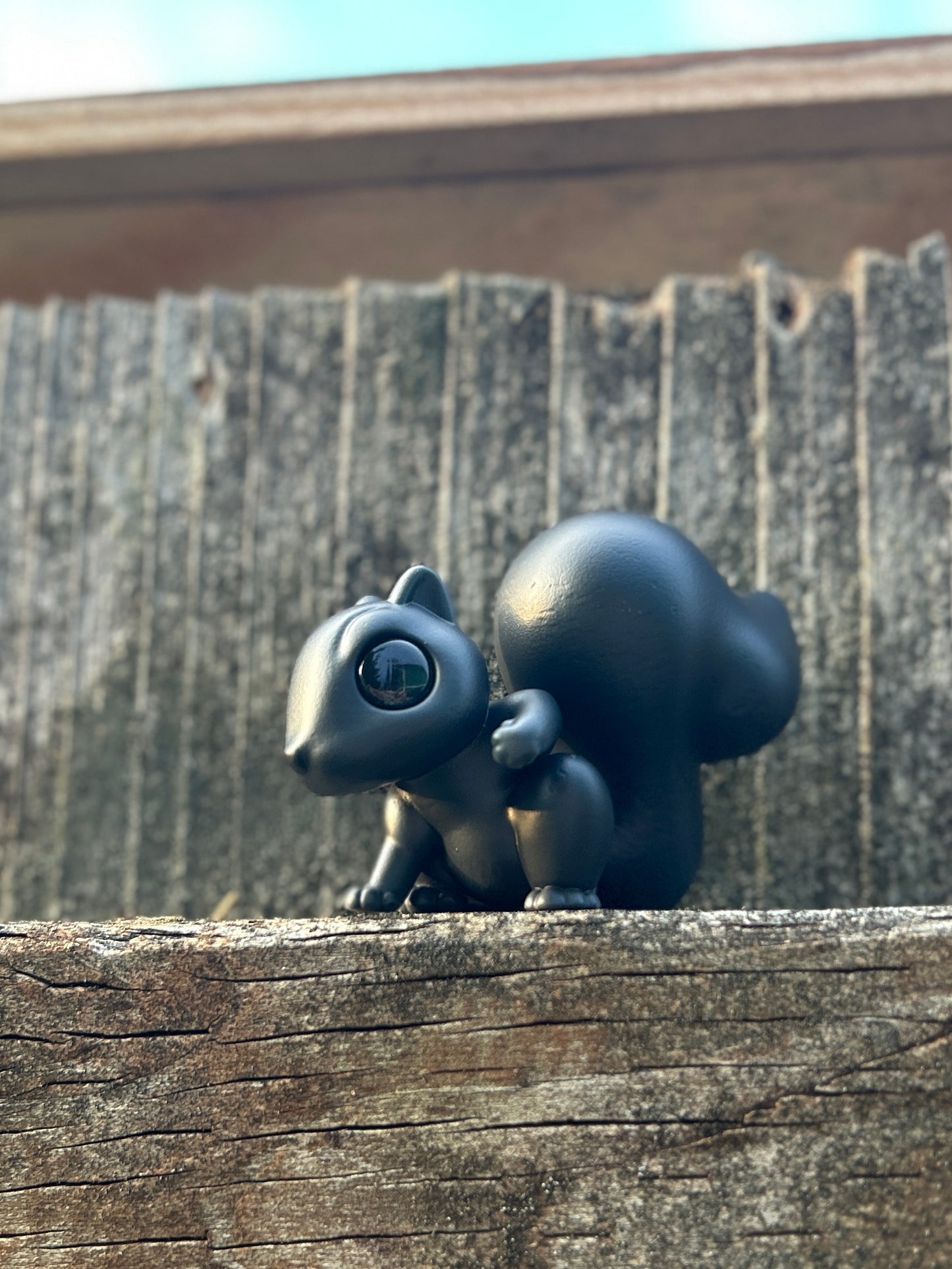 Black squirrel figure