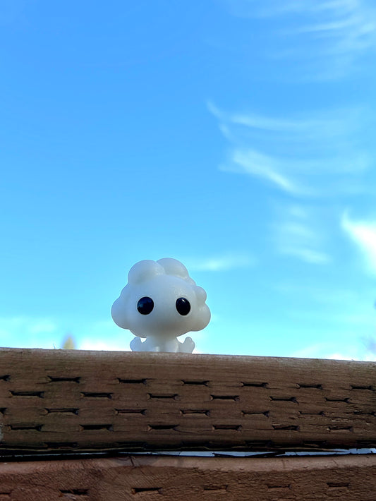 Cloud figurine in front of sky