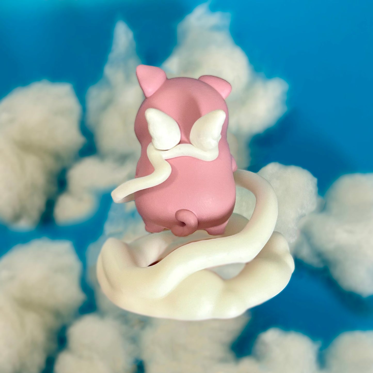 Flying pig figure on cloud stand - back