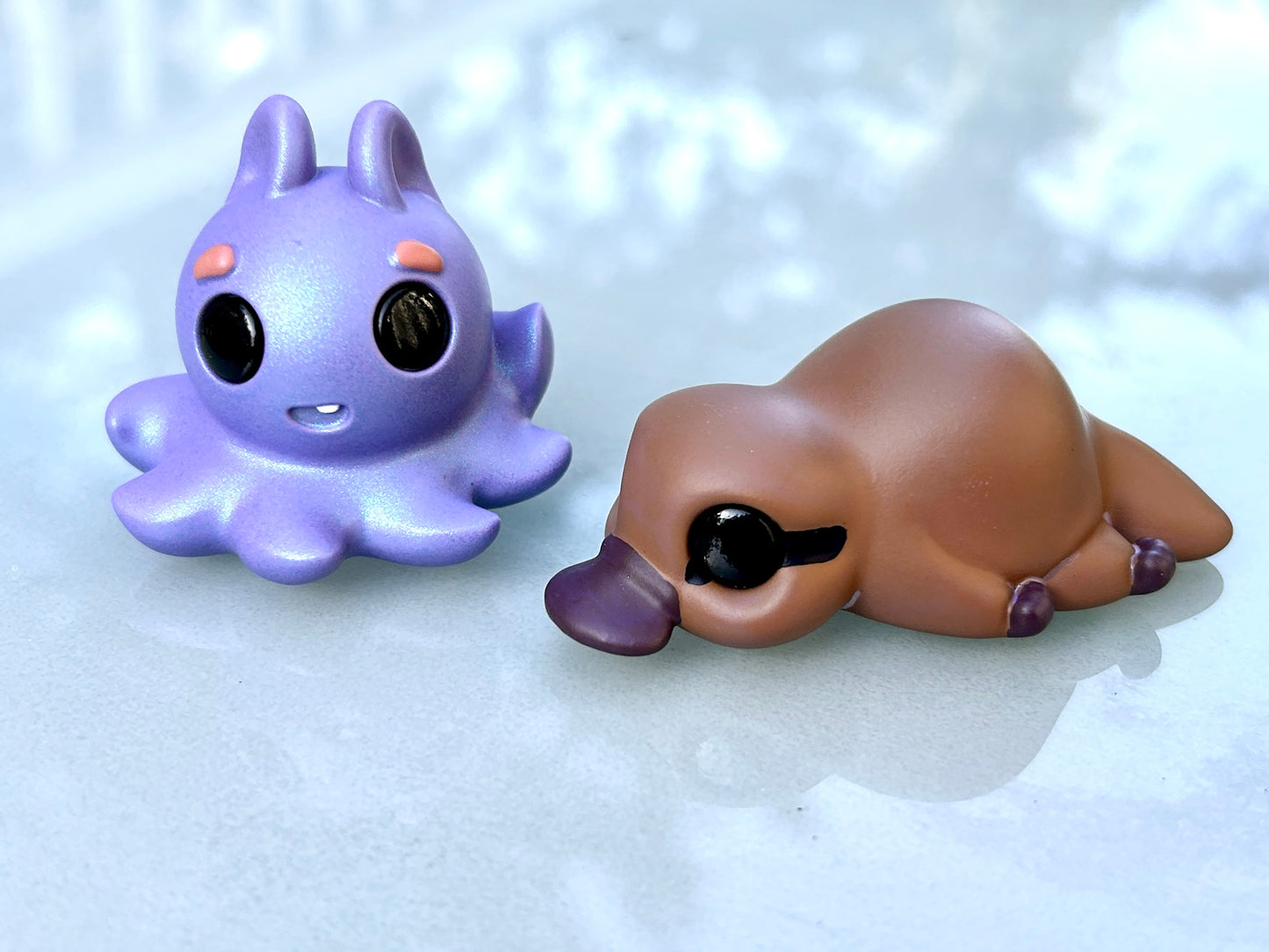 dumbo octopus and platypus figurines